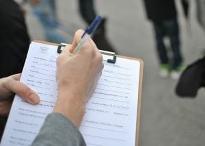 woman holding clipboard